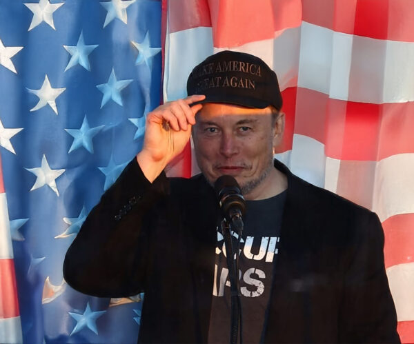 Dark MAGA Hat Elon Musk rallies onstage with Trump in Pennsylvania US